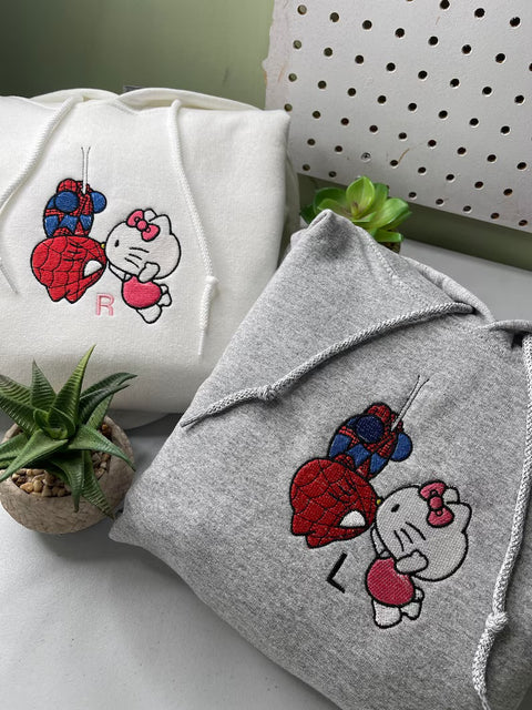 Felpa spidarman e hello Kitty bacio